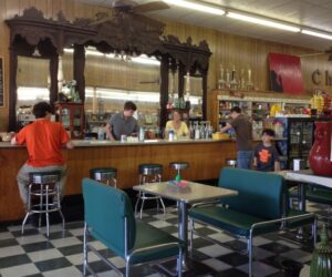 Pharmacies are often “third places” in small towns, owned by the same family for generations and still providing many residents their first jobs.